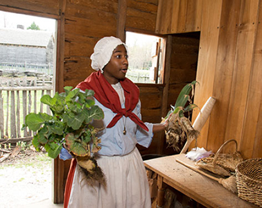 slave woman with vegetables